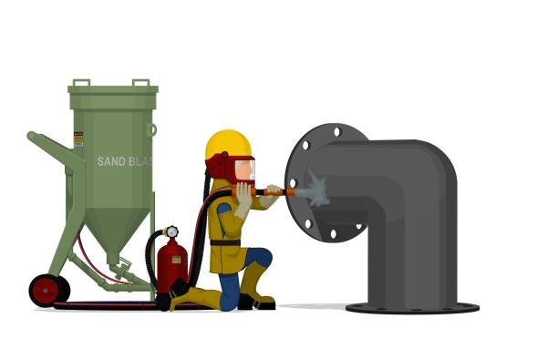 A worker is sand blasting on white background